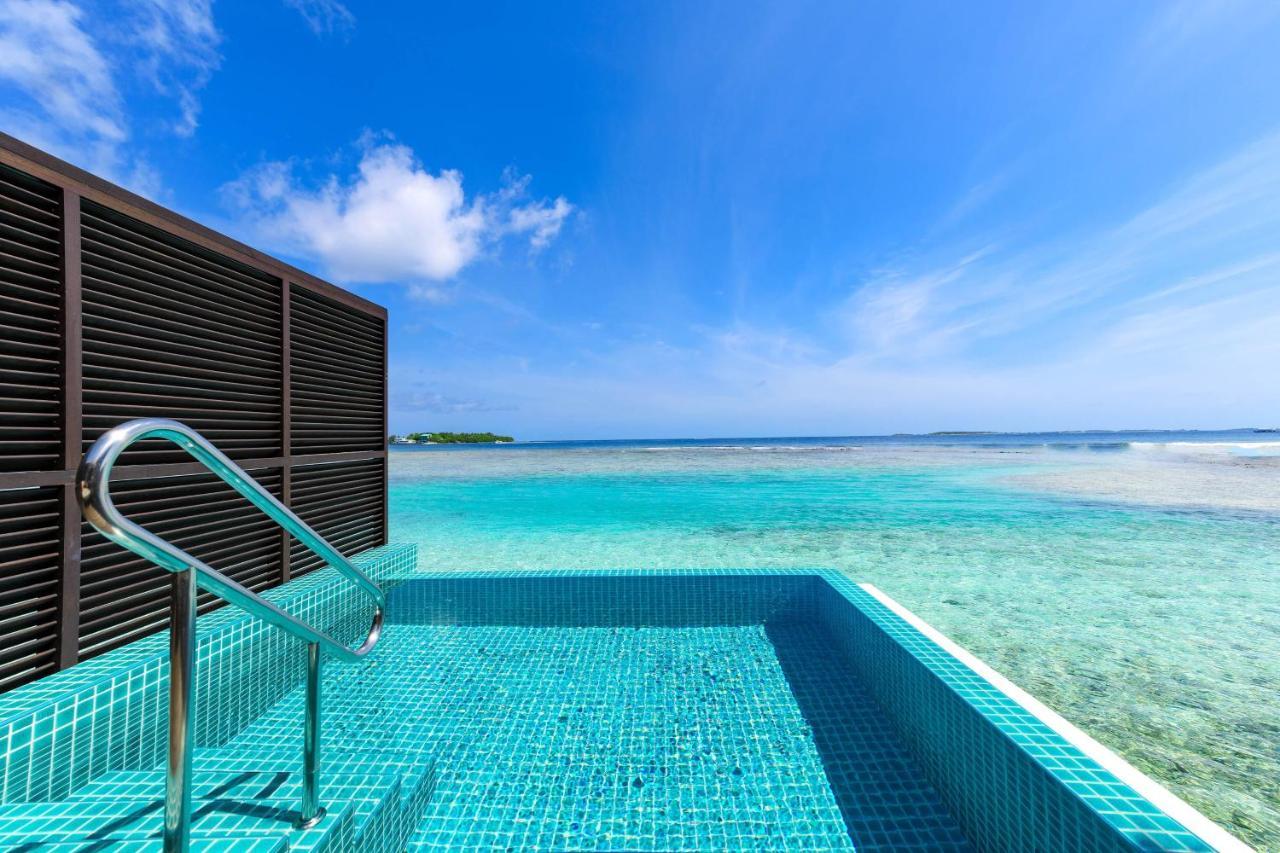 Overwater-Bungalow mit Kingsize-Bett, Pool und Meerblick